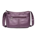 Violette Umhängetasche für Damen aus weichem Leder mit Reißverschlüssen und Webmuster-Detail - Lila