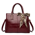 Dark red crocodile embossed handbag with a leopard print silk scarf on the handle - Burgundy