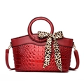 Dark red crocodile pattern handbag featuring a leopard print silk scarf detail - Burgundy