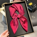 Close-up of red polka dot silk scarf tied in a bow inside a premium black gift box - Red Polka Dot (FG11-1)