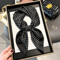 Elegant polka dot silk square scarf tied in a bow on a luxury display tray - Black Polka Dot (FG11-2)