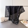 Detail of black paisley pattern scarf with star accents on breathable fabric - Black