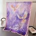 Close-up of silk scarf featuring purple phoenix print and traditional Chinese patterns - Purple