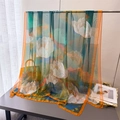 Detail showing high-quality sheer chiffon scarf with artistic green and orange lotus prints - Impressionistic White Lotus Pattern / Green