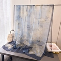 Close-up of elegant blue floral gradient silk scarf with translucent chiffon texture - Blue and White Gradient Large Floral / Gray