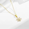 Gold stainless steel necklace featuring a six-petal flower pendant with clear zircon stones - Flower Necklace (N0053)