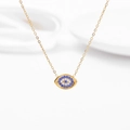 Elegant gold evil eye pendant necklace with micro-pave blue and white zircons - Oval Design / Gold Evil Eye