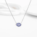 Evil eye pendant necklace with blue and white micro-set zircons on silver chain - Oval Design / Steel Color Evil Eye
