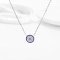 Silver Evil Eye necklace with blue and white cubic zirconia stones on white background - Steel Color with Blue Zirconia