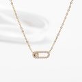 Collana a graffetta dorata con ciondolo ovale e diamante mobile incastonato in pavé - Ovale Vuoto Oro Con Zirconi Bianchi