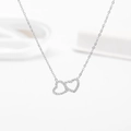 Collana in acciaio al titanio argento con doppio ciondolo a cuore e pietre di zircone - Stile Doppio Cuore / Colore acciaio