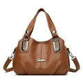 Brown leather handbag with Jinklin logo featuring U-shaped metal hardware and top handles - Yellow