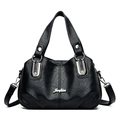 Vintage black tote bag with glossy leather texture and silver hardware accents - Black