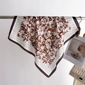 Detail of silk scarf showing vintage rose print and polka dot pattern on brown fabric - 66-70cm / Brown