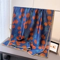 Detail of blue silk scarf with red rose pattern and smooth lightweight texture - Navy Blue (Orange Rose Pattern)