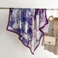 Detail of silk-like scarf with abstract purple floral print hanging on a metal rod - Purple Abstract Floral (FE182-1)