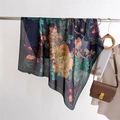 Detail of navy silk-like square scarf featuring large peony print hung near leather bag - Dark Green Vintage Peony (FM205-2)