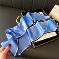 Detailed texture of blue silk twilly scarf with abstract white ink patterns on high-end bag - Freehand Wave Pattern (LE24-2) / Blue