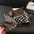 Close-up of double-sided silk scarf with orange plaid and geometric star patterns - Double Sided Hounds-tooth Grid (LE24-4) / Brown Plaid