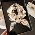 Elegant silk-style scarf with carriage and chain prints in a luxury display set - Cream with Navy Edge (LE7-3)