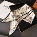 Close-up of lightweight silk-like scarf with butterfly print and black rolled edges - Black Border
