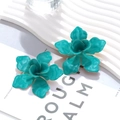 Detail of turquoise enamel flower earrings with delicate gold-plated layered petal edges - Teal