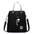 Versatile black multi-purpose backpack with silver round handle and cute bear charm - Black