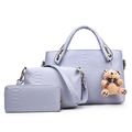 Three-piece light purple handbag set with crocodile pattern and decorative bear charm - Gray