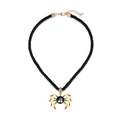 Detail of colorful spider pendant on black woven cord with golden adjustable lobster clasp - Spider