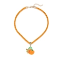 Detail of orange braided rope necklace with enameled pumpkin charm and adjustable lobster clasp - Little Pumpkin Green