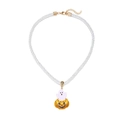 Detail of Halloween ghost emerging from glittery pumpkin on white rope necklace - Pumpkin Ghost