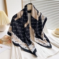 Elegant black and beige twill silk scarf with chain pattern on a white top with decor - Black and Gray