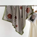 Detail of luxury 90cm square silk scarf with houndstooth and red camellia floral prints - Green Border