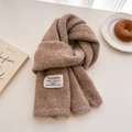 Detail of soft brown knit scarf featuring a vintage textile label on plush wool fabric - 156x24cm / Coffee