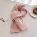 Close-up of pink wool knit scarf with brand label and elegant table setting - 156x24cm / Pink