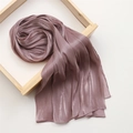 Close-up of pleated lotus pink scarf with glossy finish and delicate vertical textures - 180x70cm / Deep Purple