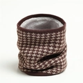 Close-up of winter knit infinity scarf featuring brown houndstooth pattern and thick fleece lining - Brown