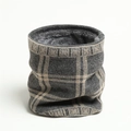 Detail of grey knitted neck warmer featuring thick fleece lining and beige checkered pattern - Gray