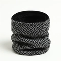 Detail of winter neck warmer featuring geometric jacquard pattern and thick black fleece lining - 25cm / Black