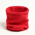 Close-up of red knitted neck warmer with thick checkered pattern and soft fleece lining - Red