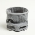 Close-up of grey waffle knit snood scarf featuring thick plush fleece lining for warmth - Gray