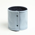 Detail of light blue winter neck warmer with dark navy fleece lining and snap buttons - 25x17cm / Blue