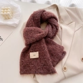 Detail of burgundy wool knit scarf with white speckled texture on a beige blazer - 160x21cm (Including Tassels) / Brown Red