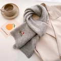 Detail of light gray knit scarf with colorful dachshund embroidery on a blazer - 164x20cm / Gray