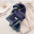 Blue-green gradient knit wool scarf laid on a beige blazer with a winter cozy aesthetic - 166x20cm / Deep Sea Blue