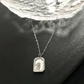 Collana d'argento con ciondolo a forma di coniglio quadrato e bordo a pois - Argento