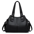 Classic black leather tote bag with pebble texture and silver hardware on white background - Black