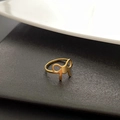 Minimalist golden bow-shaped ring with polished stainless steel finish for women - Gold