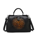 Vintage black leather handbag with brown embossed floral pattern and shoulder strap - Black