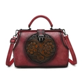 Vintage dark red leather satchel with embossed floral pattern and black rubbed finish - Red